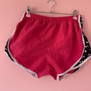Pink knock off nike shorts with bows on sides